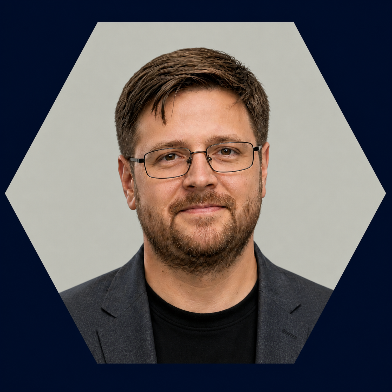 Steven Molter headshot in a hexagonal frame